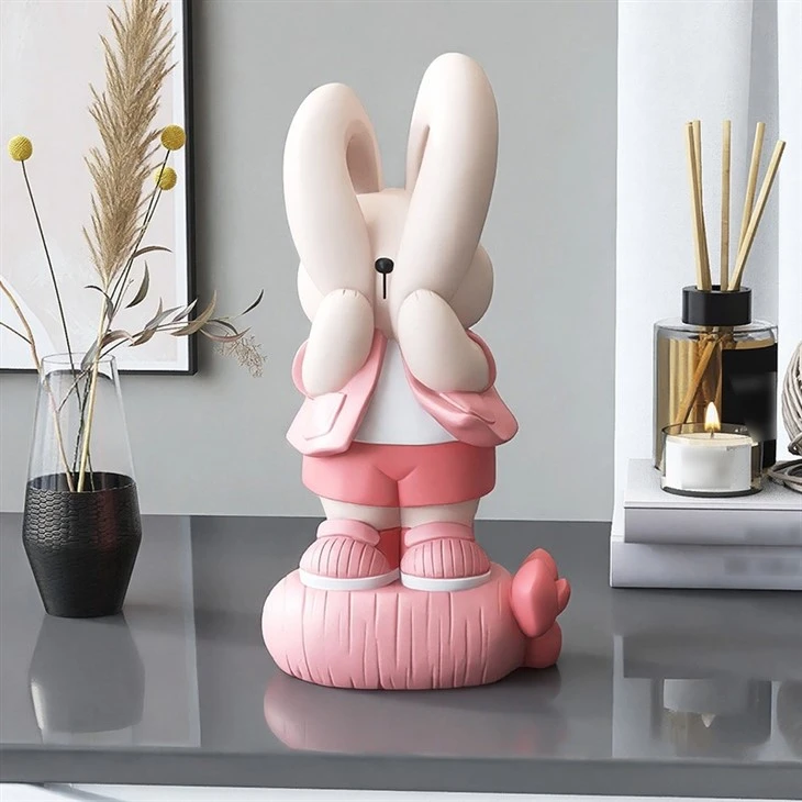 Bunny Cover Face Statue